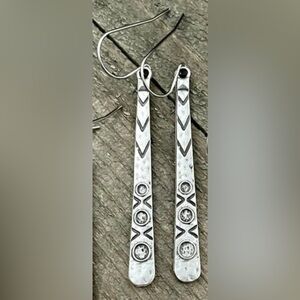 NWT- sleek and slim silver tone dangle earrings with stainless steel earwire